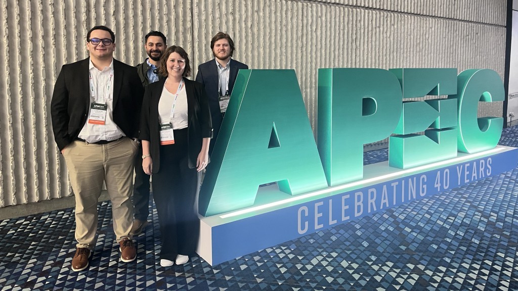 Lab members at APEC 2025 conference.