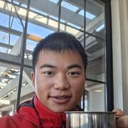 I, in red coat, am holding a cup of apple cider.